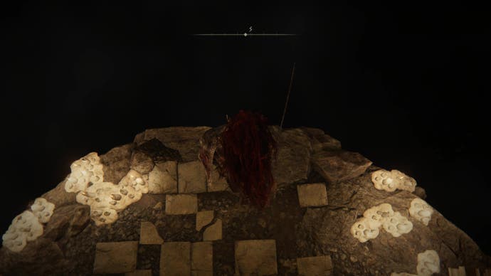 A warrior approaches a large, ominous hole in the Dragon's Pit in Shadow of the Erdtree