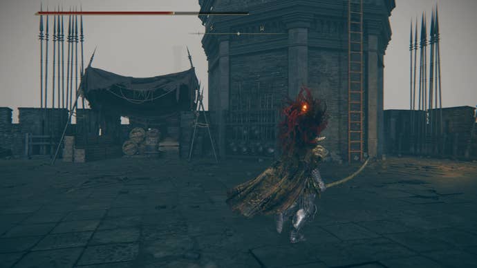 A warrior goes to climb a ladder in the Fort of Reprimand in Shadow of the Erdtree.