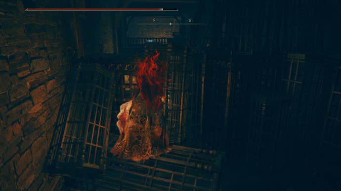 A warrior spies a treasure chest at the end of some jail cages in the Fort of Reprimand in Shadow of the Erdtree.