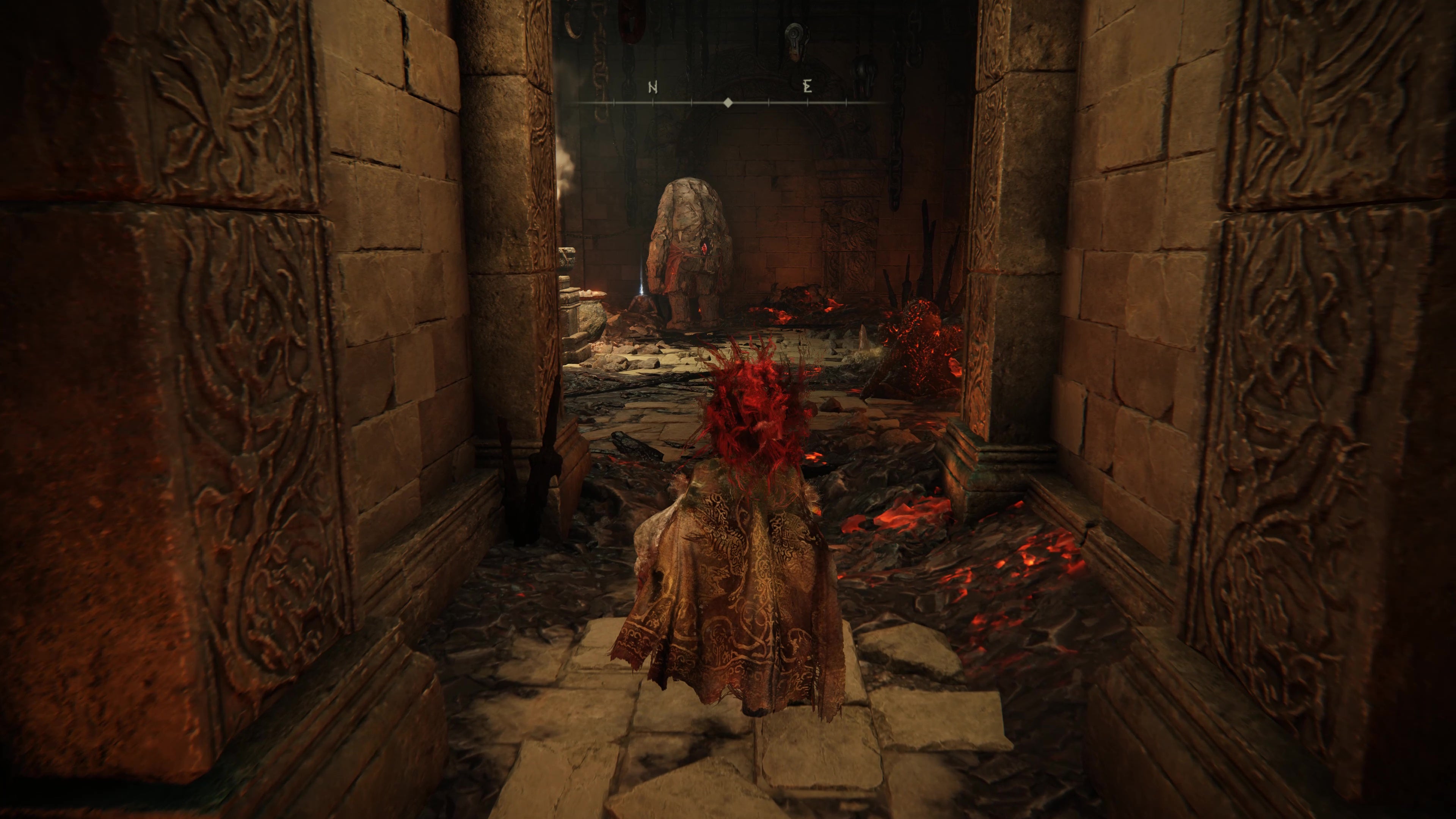 A warrior enters the Ruined Forge Lava Intake dungeon in Shadow of the Erdtree.