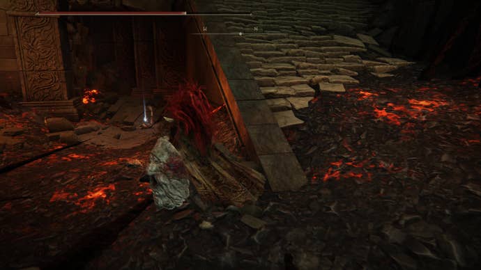 A warrior runs toward a shining corpse in the Ruined Forge Lava Intake dungeon in Shadow of the Erdtree.