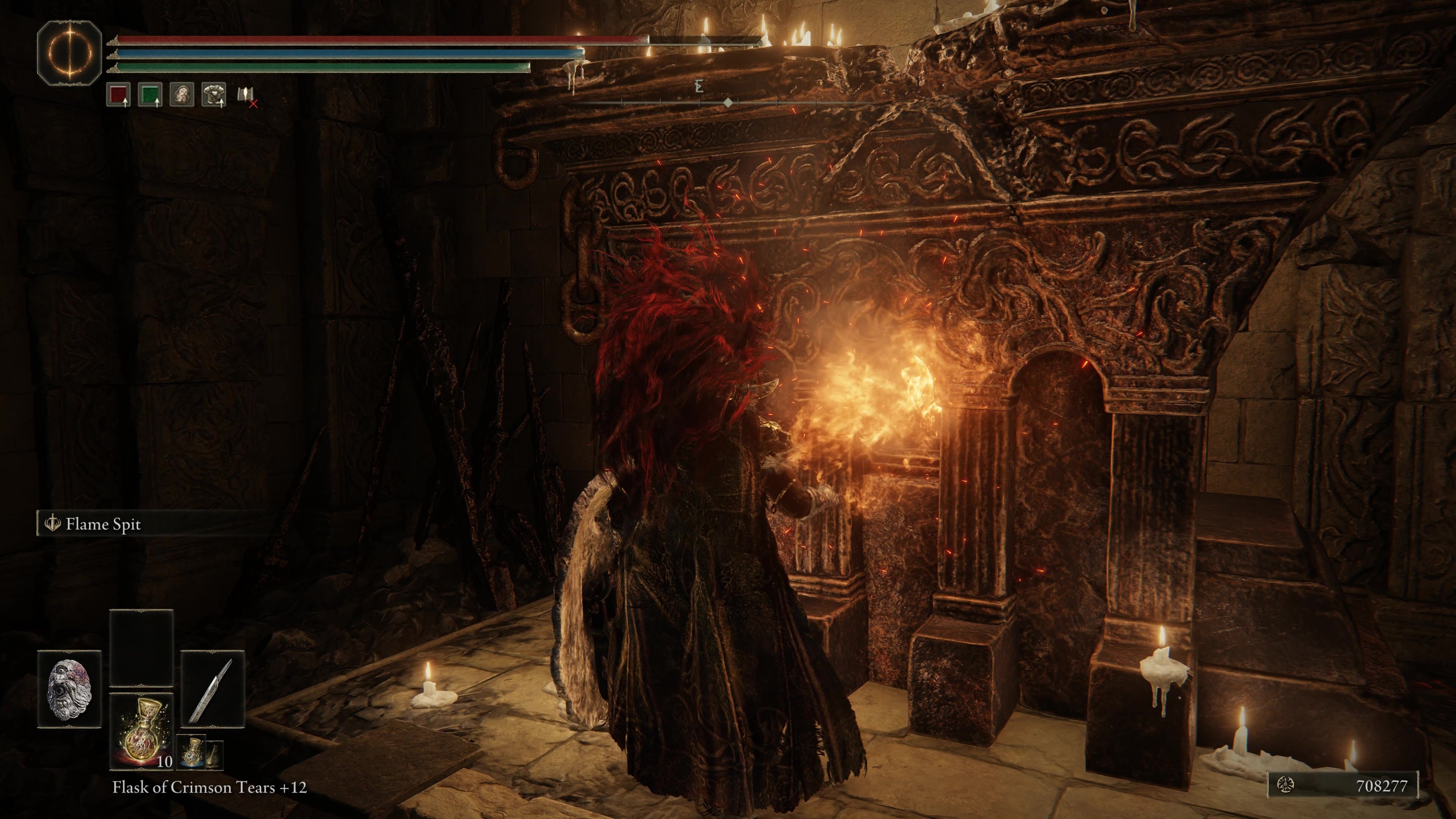 A warrior touches a fiery altar in the Ruined Forge Lava Intake dungeon in Shadow of the Erdtree.