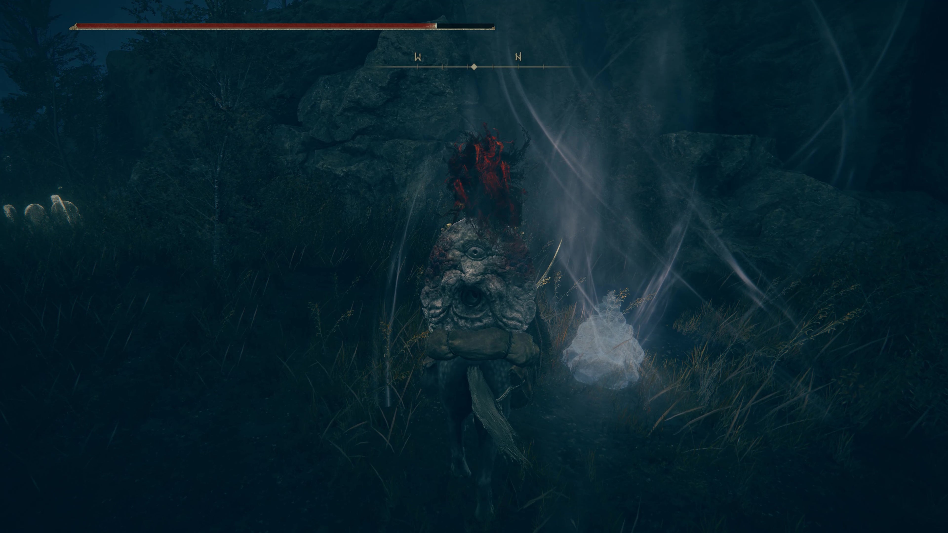 A warrior approaches a sealed Spiritspring  in Gravesite Plain in Shadow of the Erdtree.