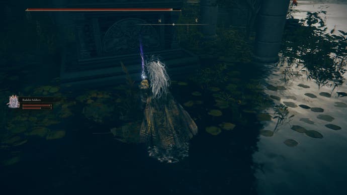 A warrior approaches an item in a watery church in Shadow of the Erdtree.