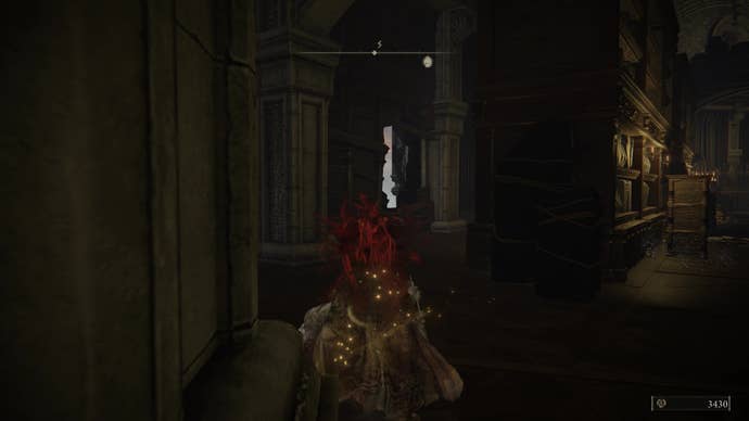 A warrior spies a hole in the wall on the way to the Shadow Keep’s Back Gate in Elden Ring Shadow of the Erdtree.