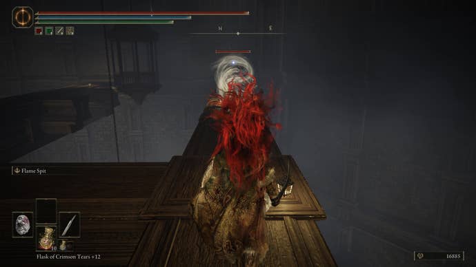 A warrior braces for a spell attack from a Fire Knight on the way to the Shadow Keep’s Back Gate in Elden Ring Shadow of the Erdtree.