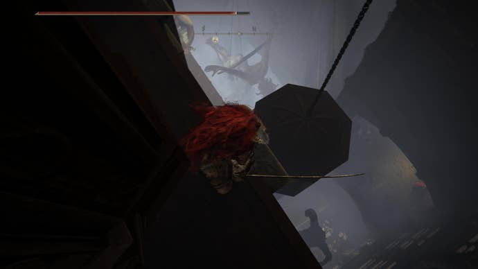 A warrior prepare s to drop down onto a lift on the way to the Shadow Keep’s Back Gate in Elden Ring Shadow of the Erdtree.