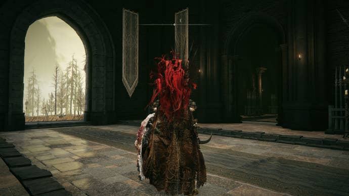 A warrior stands in front of two doorways at the Shadow Keep’s Back Gate in Elden Ring Shadow of the Erdtree.