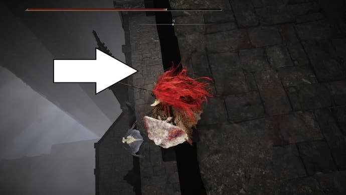 A warrior looks over a ledge, where a white arrow points to where they should drop to obtain the Impenetrable Thorns Sorcery spell in Elden Ring Shadow of the Erdtree.