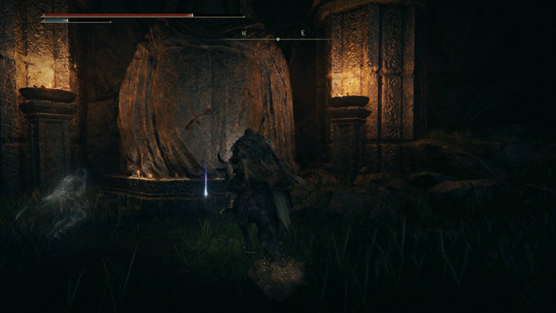 The Tarnished collecting an item from a temple in Elden Ring Shadow of the Erdtree. - 4