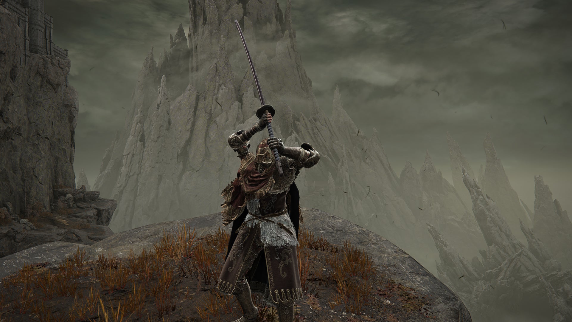 Elden Ring: Shadow Of The Erdtree screenshot of the Tarnished wielding the Great Katana and charging it's Weapon Skill on a clifftop. - 3