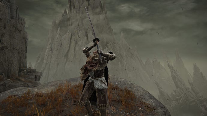 Elden Ring: Shadow Of The Erdtree screenshot of the Tarnished wielding the Great Katana and charging it’s Weapon Skill on a clifftop.