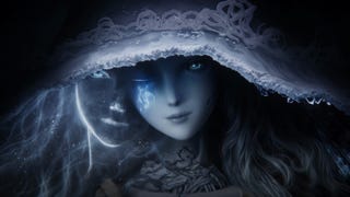 A pale woman with a white witchy hat and one eye closed leaking blue energy in Elden Ring's story trailer.
