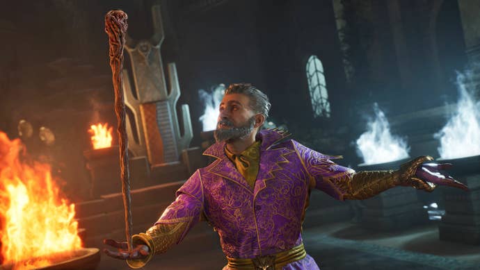 A purple-robed necromancer balances his unit successful the thenar of his manus arsenic flames pain down him.