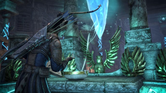 An archer leans over a scribing table with a large blue crystal at the centre in the Gold Road chapter of The Elder Scrolls Online