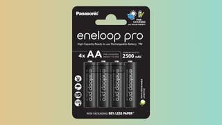 Eneloop Pro AA batteries in packaging on a gradient background