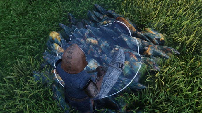 The player in Enshrouded mines a Flintstone patch.