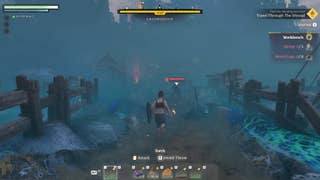 A player character rushes towards a zombified soldier in the Shroud, wielding a torch.