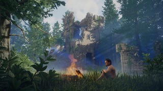 A shirtless lone male character sitting by a lit campfire in a ruin in Enshrouded.