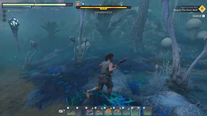 An Enshrouded character runs around a surreal, blue-tinged forested area inside the Shroud.