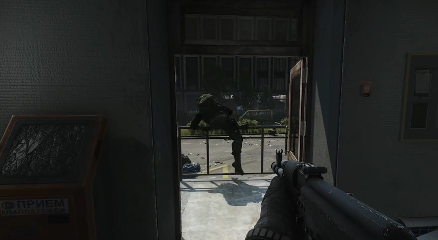 A player leaps over a railing in Escape From Tarkov.