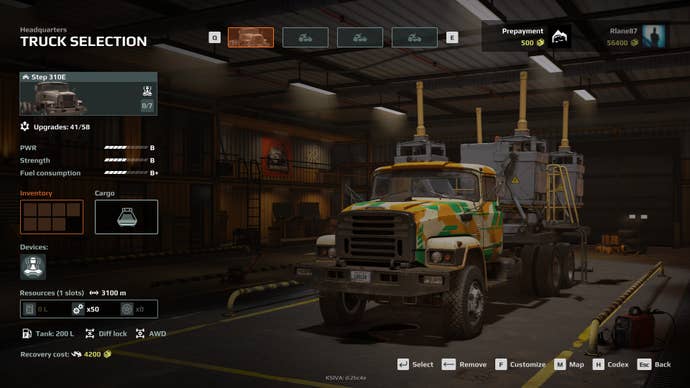 A screenshot from Expeditions: A Mudrunner Game, which shows a truck in a garage.