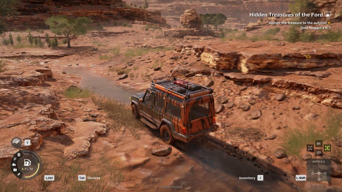 A small jeep races through rocky desert in Expeditions: A Mudrunner Game.