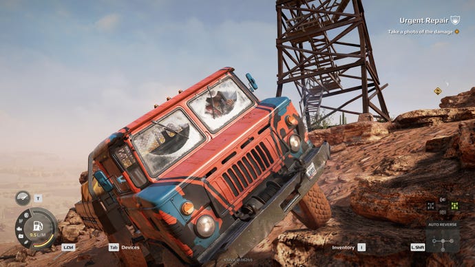 A large truck navigates a series of rocks in Expeditions: A Mudrunner Game