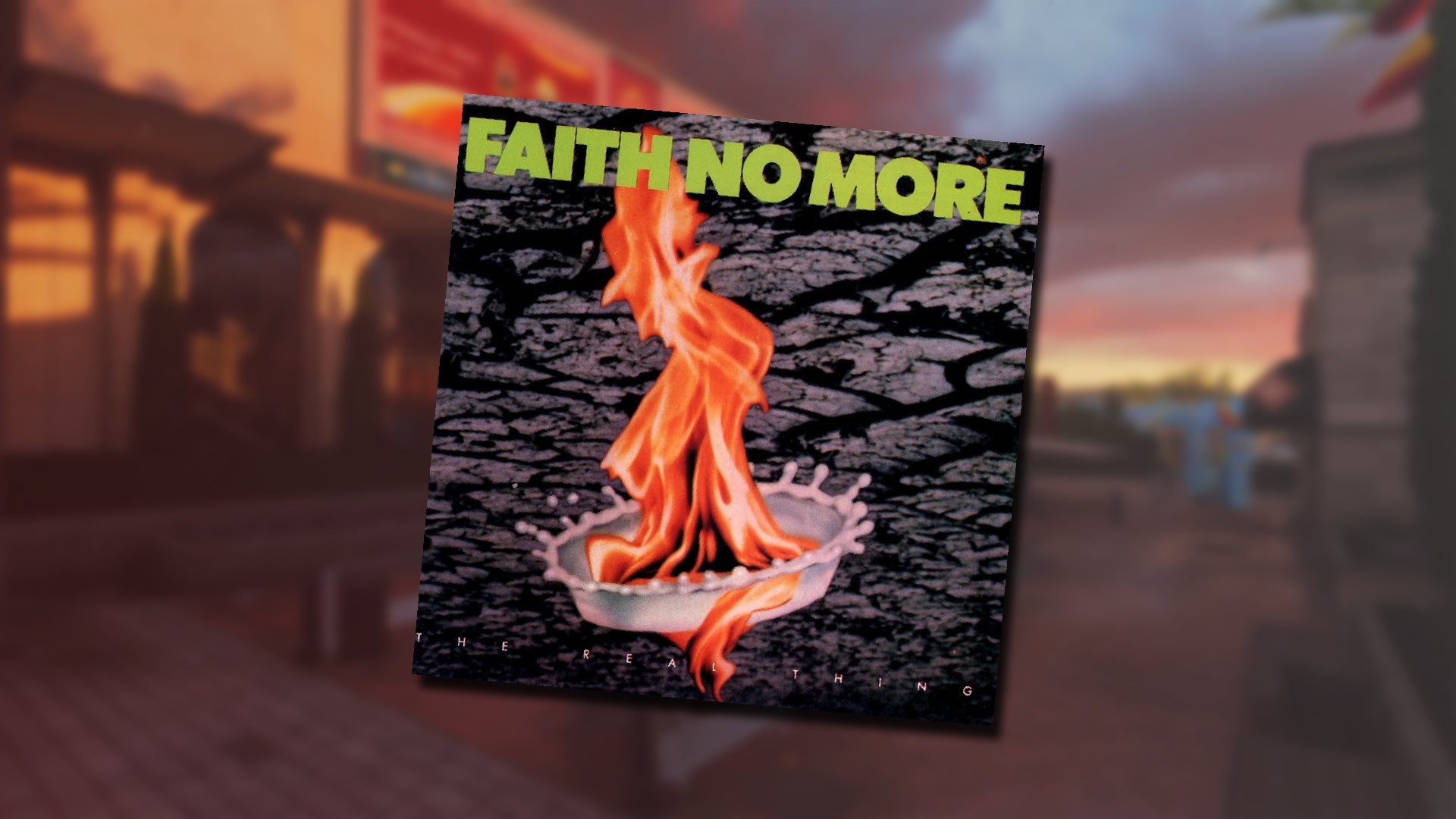 The album art of Faith No More's 'The Real Thing' over a blurred background of the Red Card map in Black Ops 6. - 1