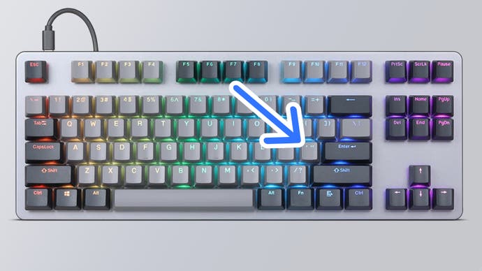 Arrow poitning at apostrophe key on keyboard.
