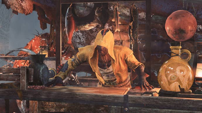 A fish-person wearing a yellow raintcoat is stood in an outdoor shop, hands on the table in Fallout 76.
