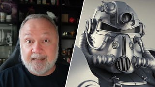 Tim Can next to a suit of Fallout's T-51 power armour.