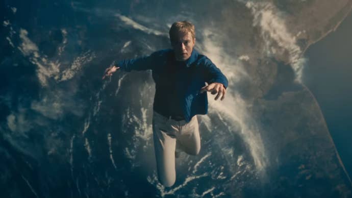 Joseph Quinn as Johnny Storm in The Fantastic Four: First Steps, he’s almost left earth’s atmosphere and is falling back down.