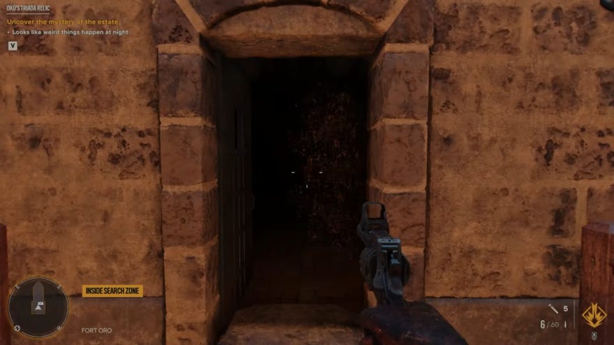 A screenshot of the open door to Fort Oro, home of Oku’s Triada Relic in Far Cry 6.