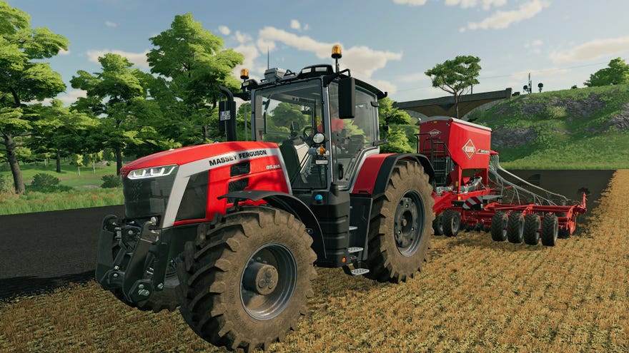 A tractor works a field in a Farming Simulator 22 screenshot.