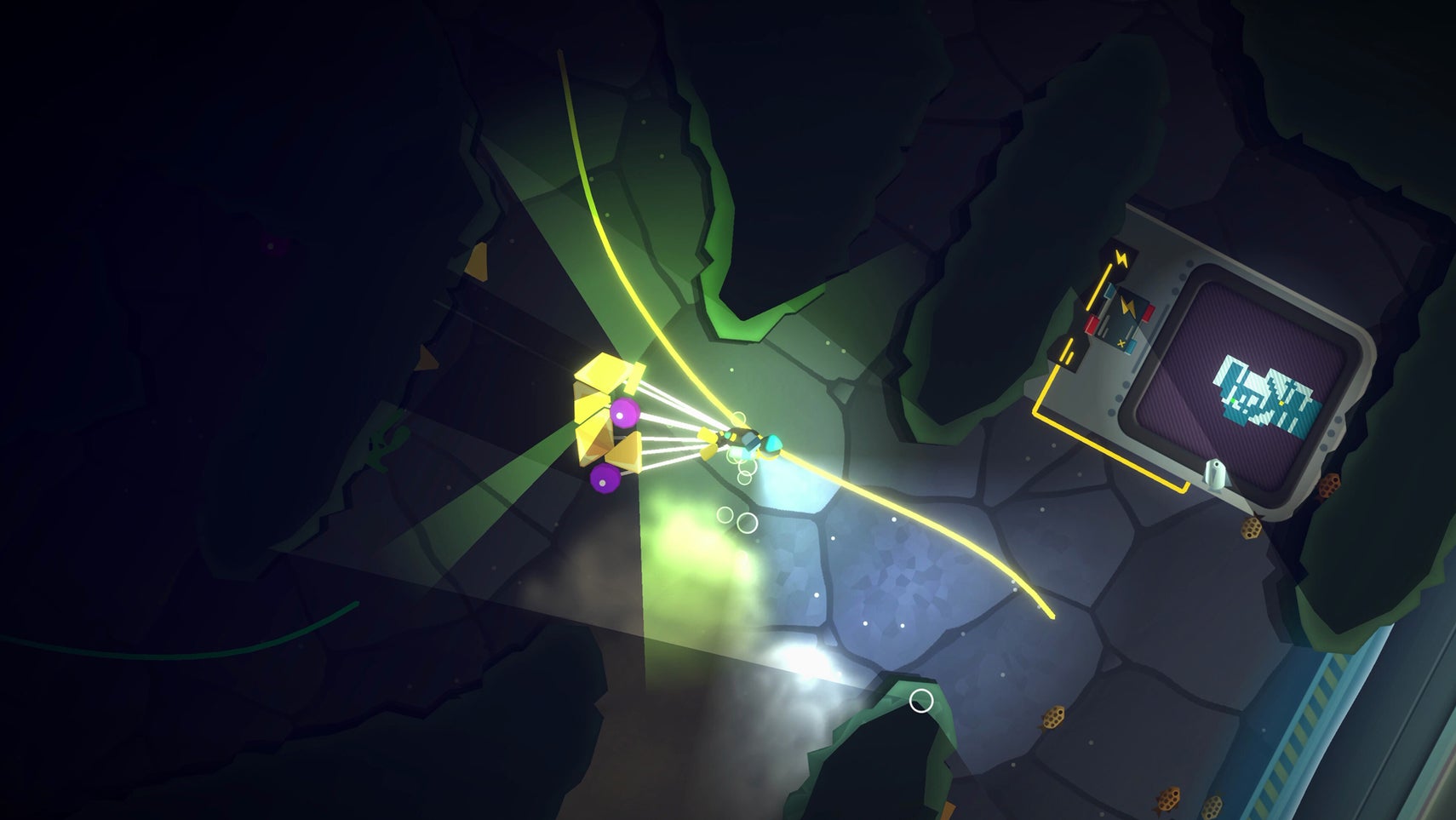 Still from Feed the Deep showing a diver exploring a deepsea cave, some kind of machine with a map on it can be seen. - 1