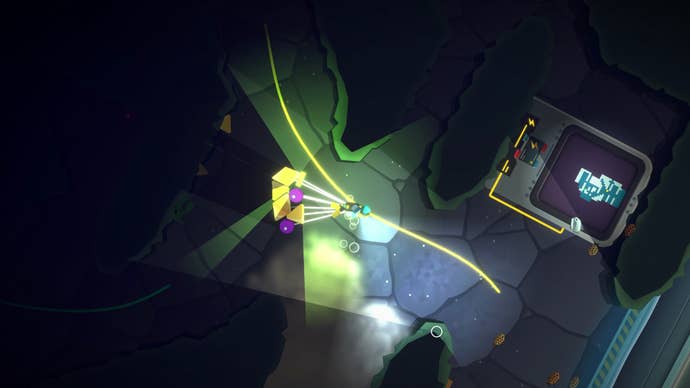 Still from Feed the Deep showing a diver exploring a deepsea cave, some kind of machine with a map on it can be seen.