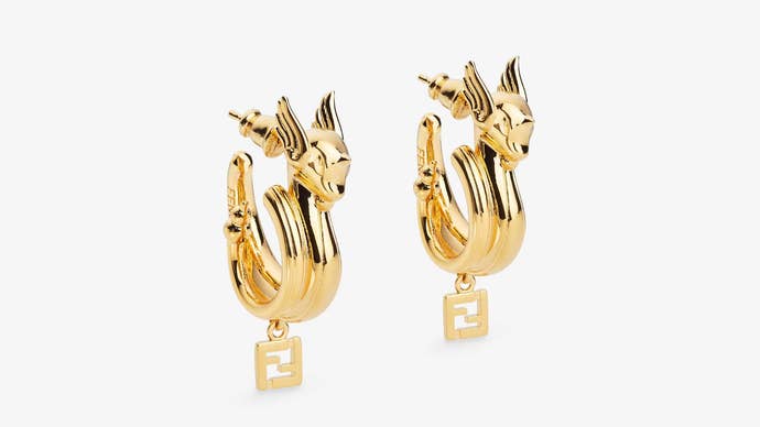Gold Fendi earrings in the shape of the Pokemon Dragonair
