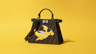A brown Fendi handbag featuring a picture of the Pokemon Dragonite