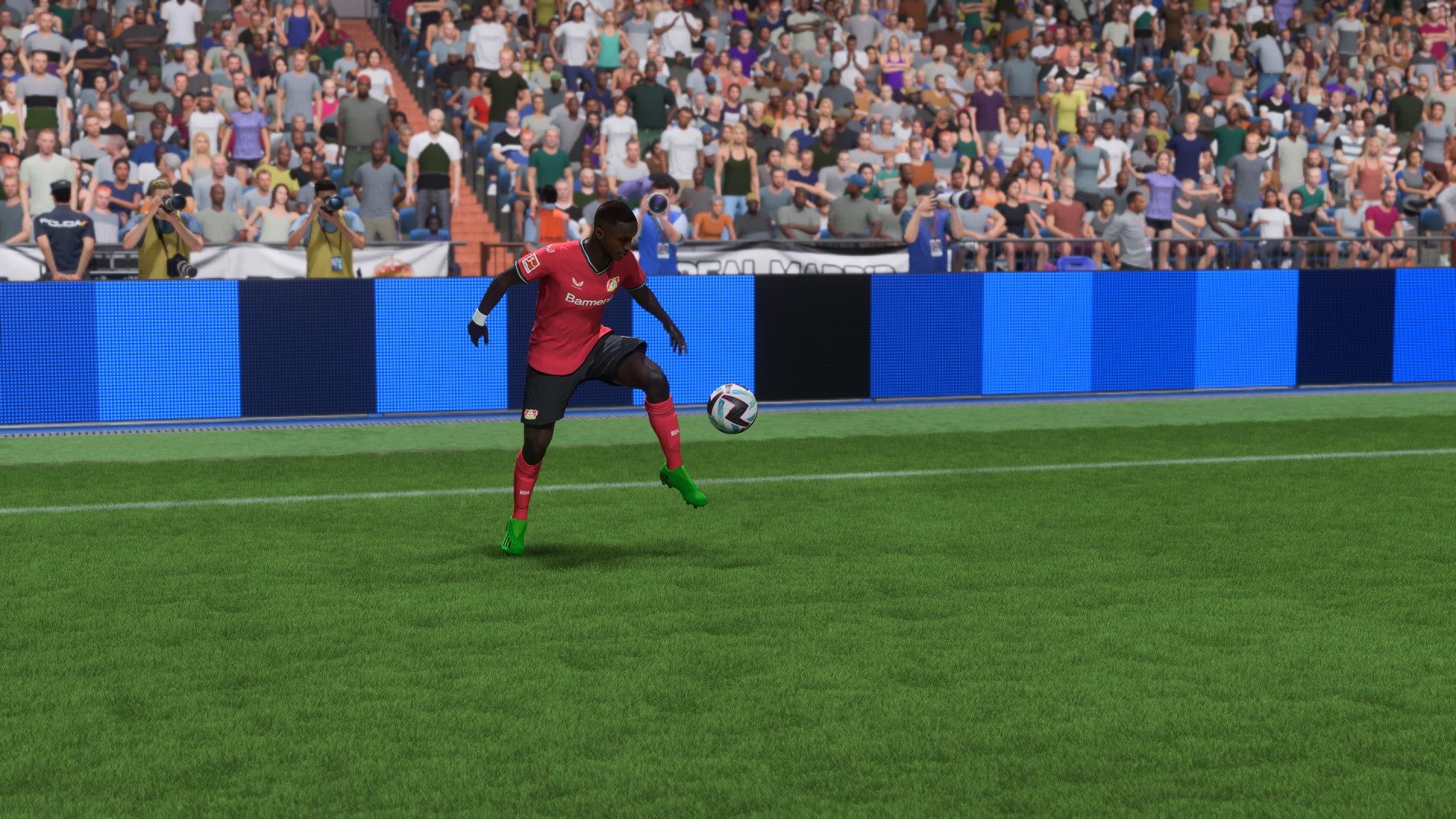 Bayer Leverkusen's Moussa Diaby controls a bouncing ball on the touchline in FIFA 23 - 5