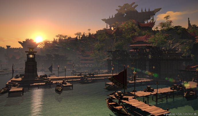 The sun sets over the water and docks of a new area in Final Fantasy 14 expansion Dawntrail