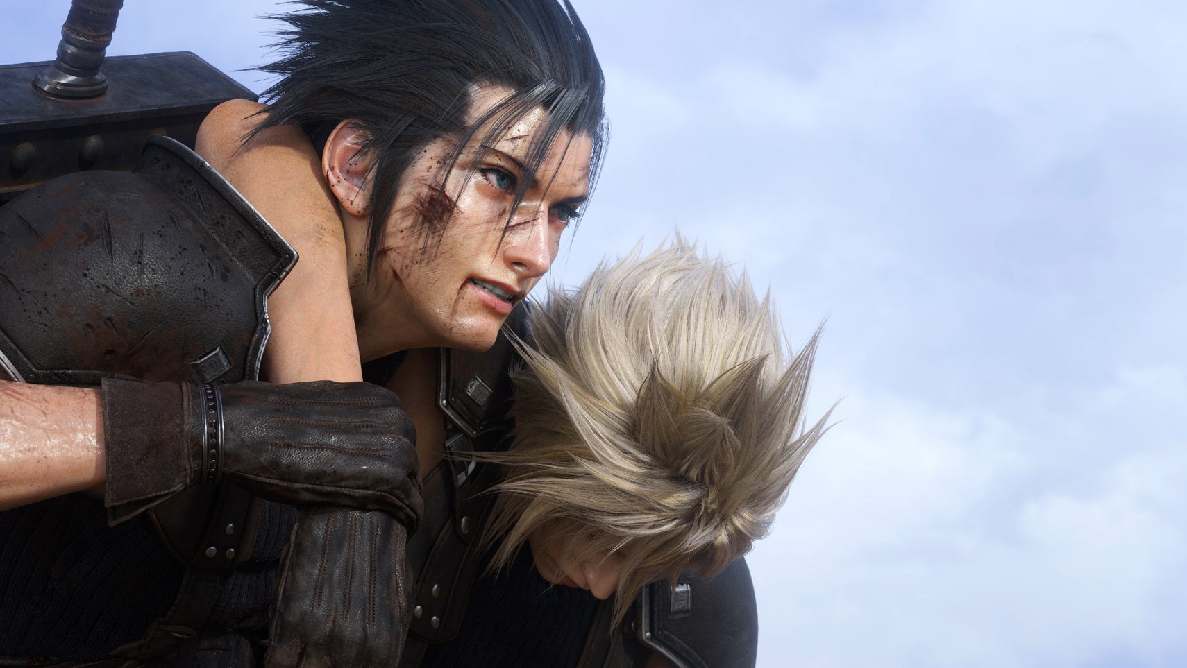 Final Fantasy 7 Rebirth screenshot showing Zack, a man with big, pushed back spiky hair, dirt and scratches on his face, carrying Cloud, a man with shorter, equally spiky blonde hair, unconscious. - 1