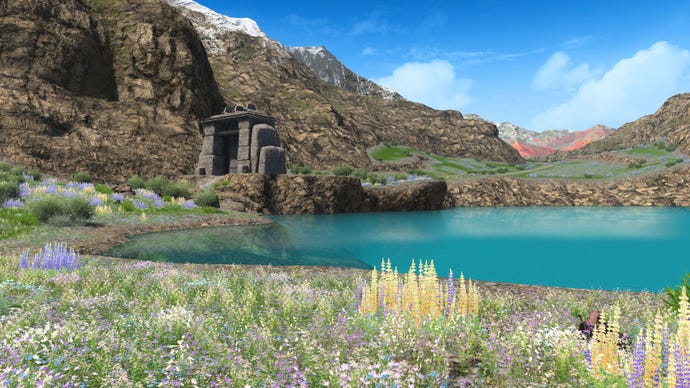 A mountain lake with striking blue water, like glacial melt.