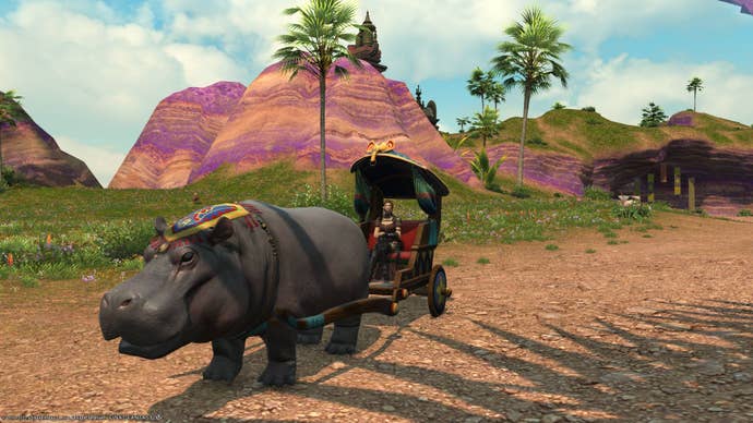 FF14 State of the Game - the player in a caraven being towed by a kind of hippo creature in a desert-like environment