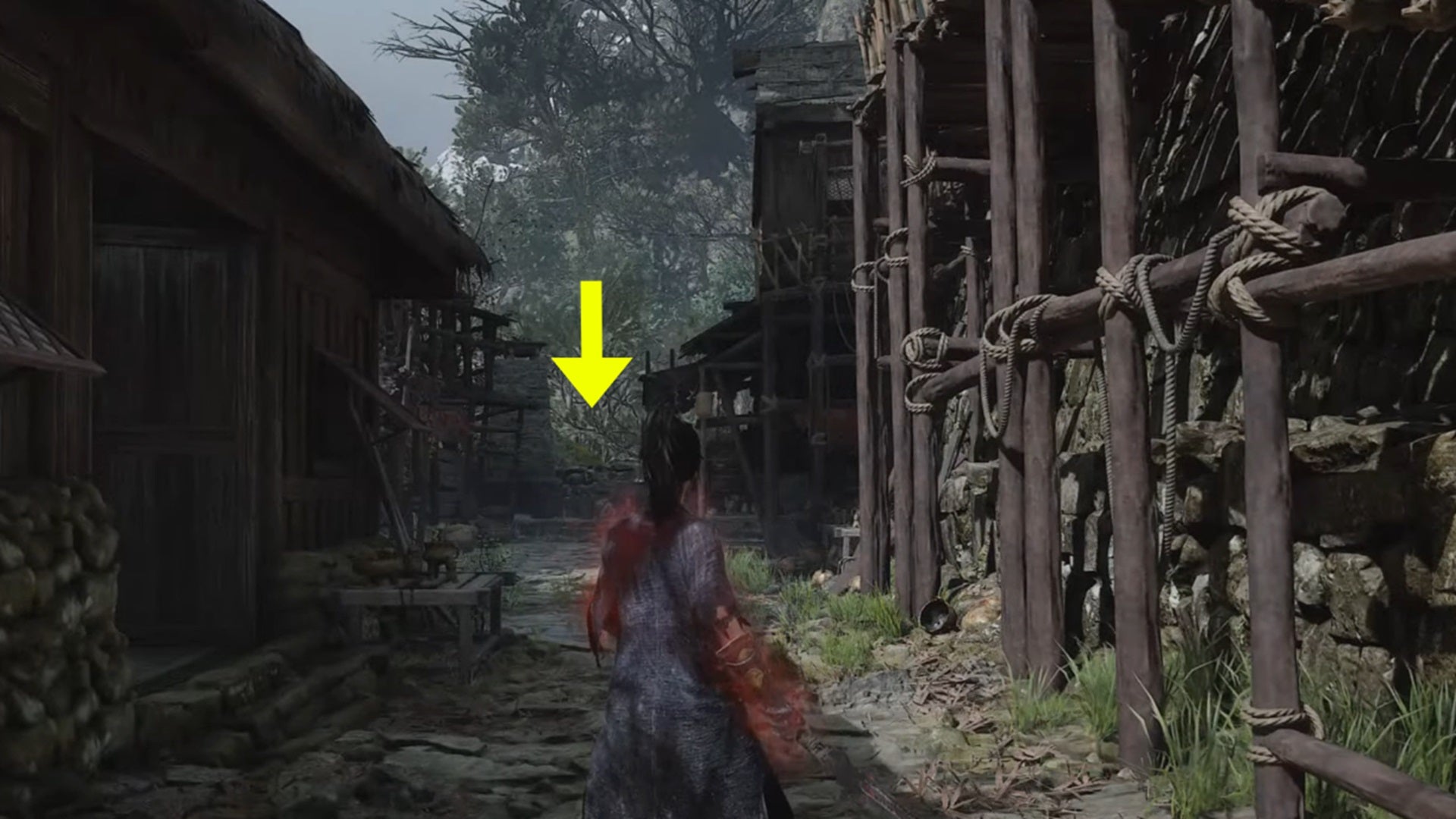 A yellow arrow points to the Firearm Blades' location, at the end of an alleyway in Worship's Rise  in Wuchang Fallen Feathers. - 14