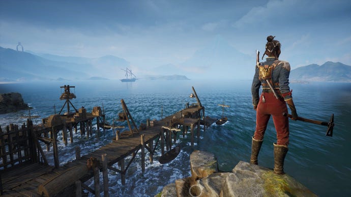 The player looks out to sea on an outcrop above two wooden piers.