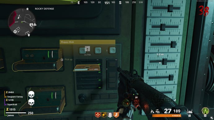 The floppy disk from capturing mimics finally emerges from the memory machine in Firebase Z.