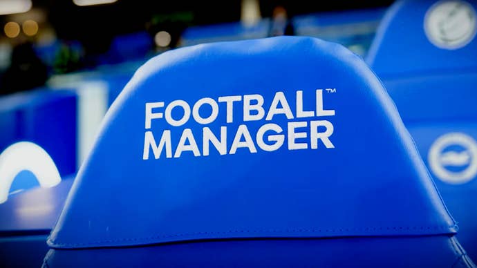 A spot astatine a shot stadium with Football Manager embroidered onto it.