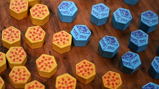 Fort board game pizza and toy tokens
