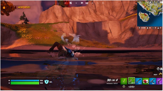 Fortnite, a character with level one heat is swimming across a river.